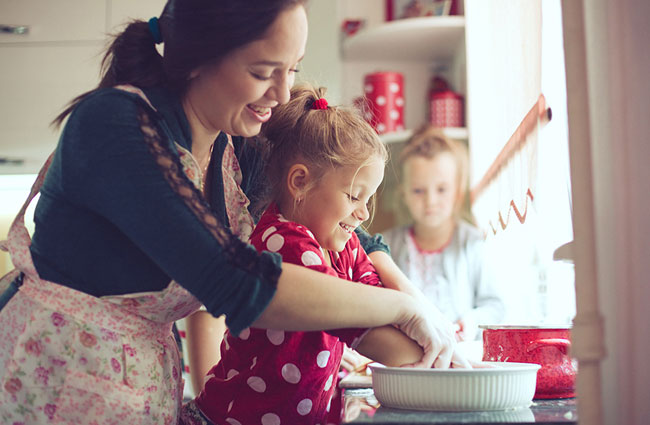 mom baking together with children 