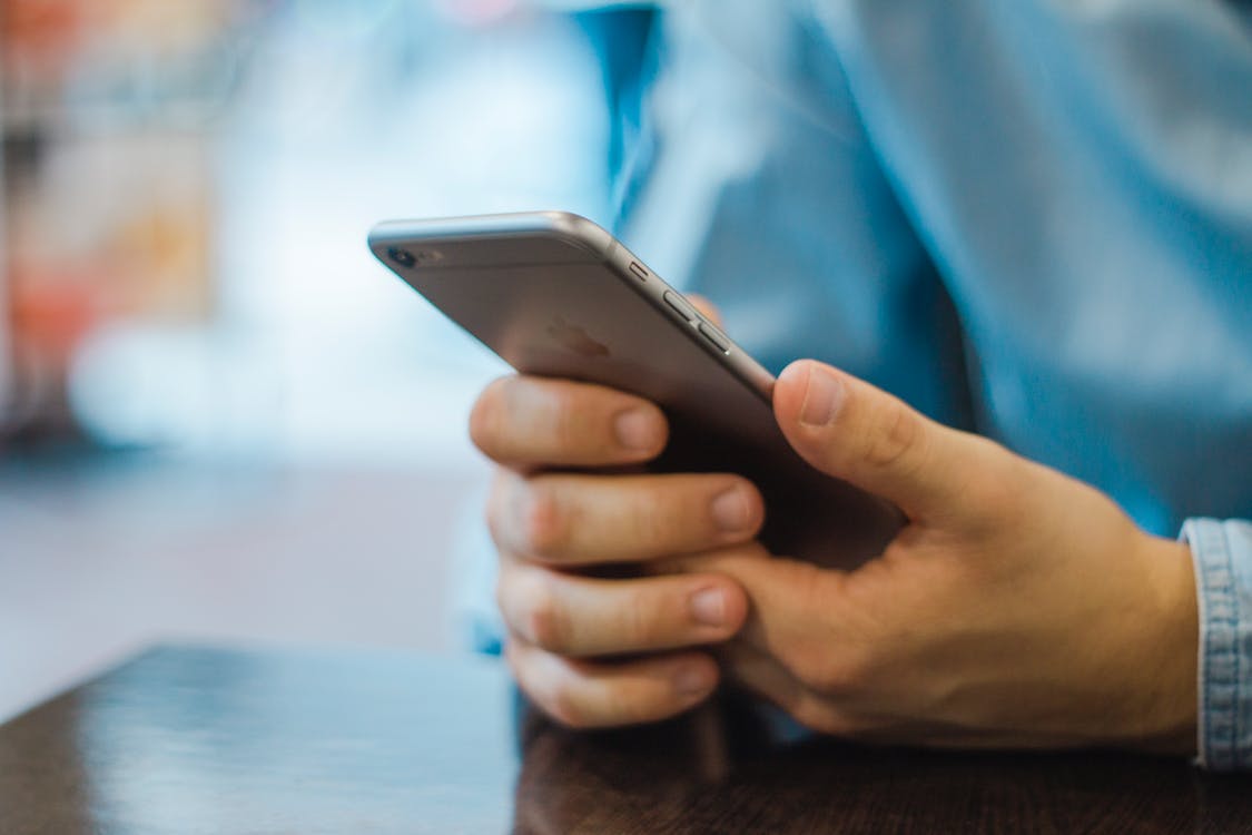 man holding a mobile phone 