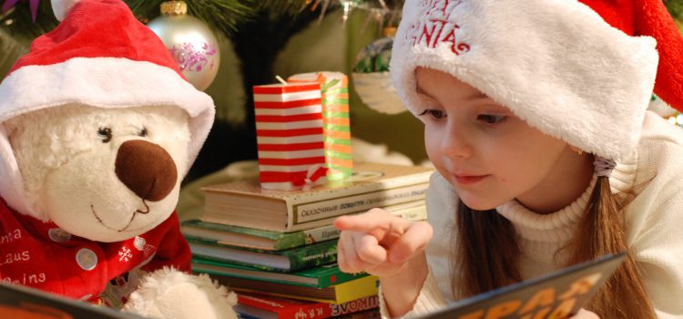 little girl with beart plush toy